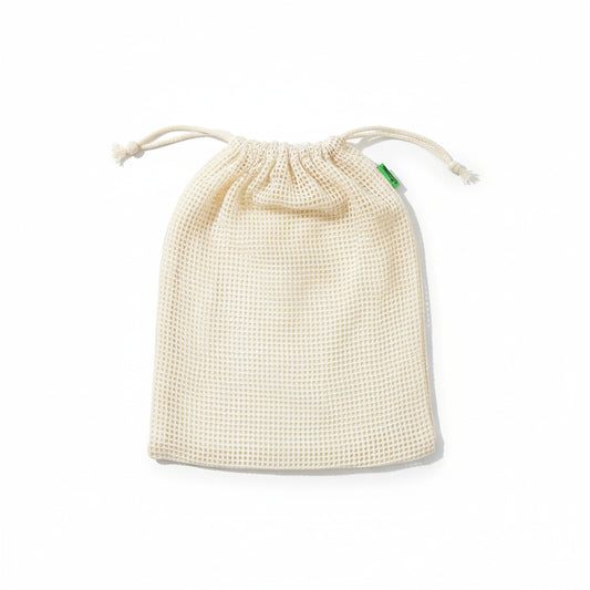 Single reusable cotton mesh produce bag on a white background, showing the medium-size drawstring bag shape and texture.