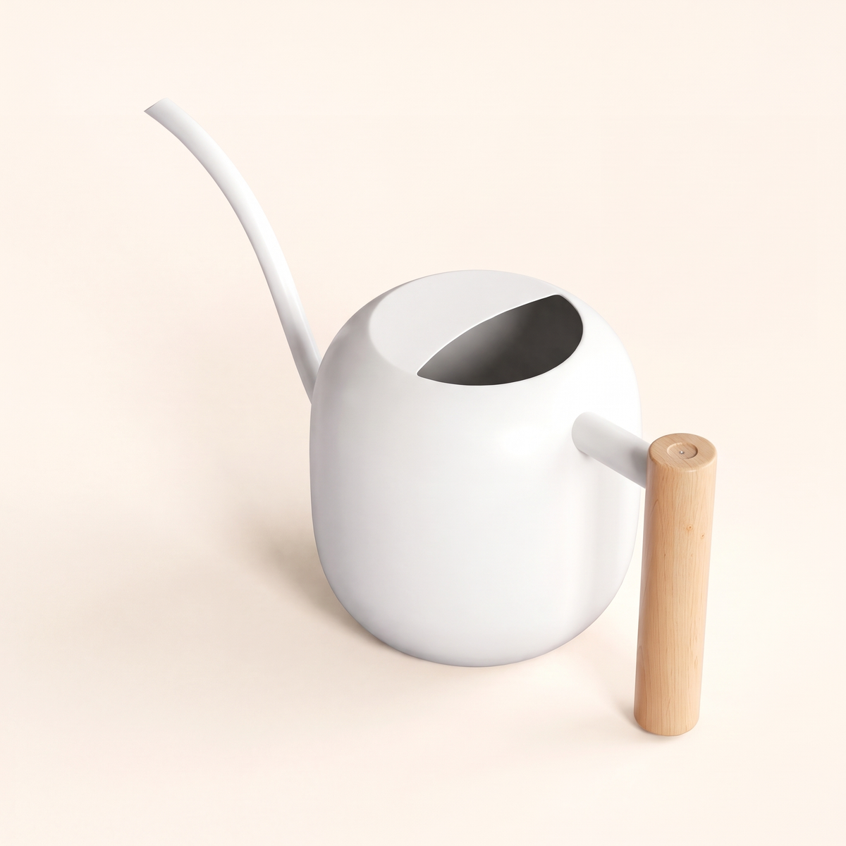 White watering can from the handle side, showing its rounded body and spout
