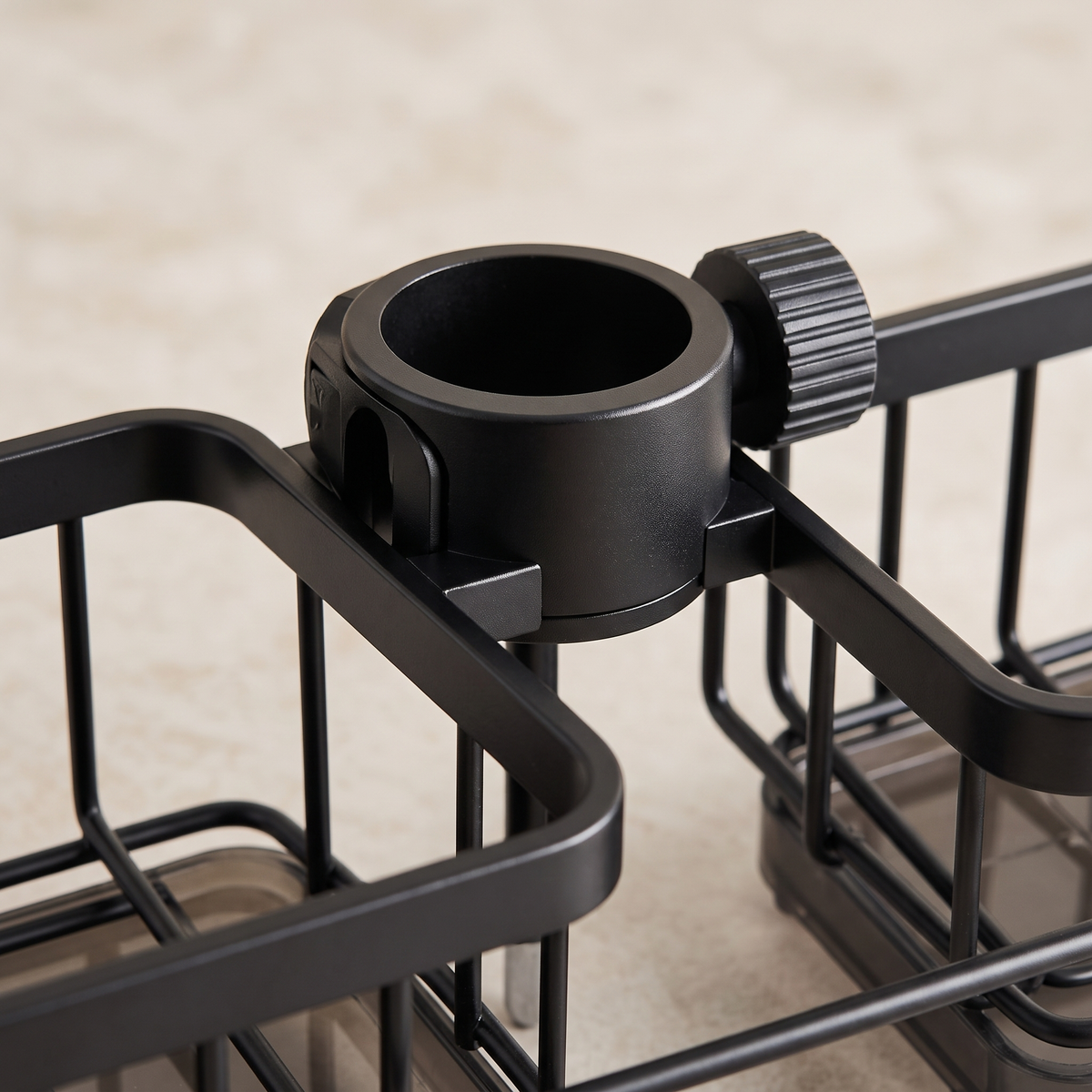 Close-up of the black tap collar and its screw cap