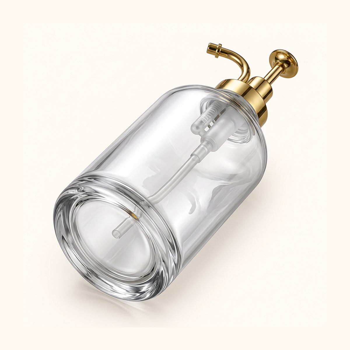 Clear glass pump bottle lying on its side, showing the round base