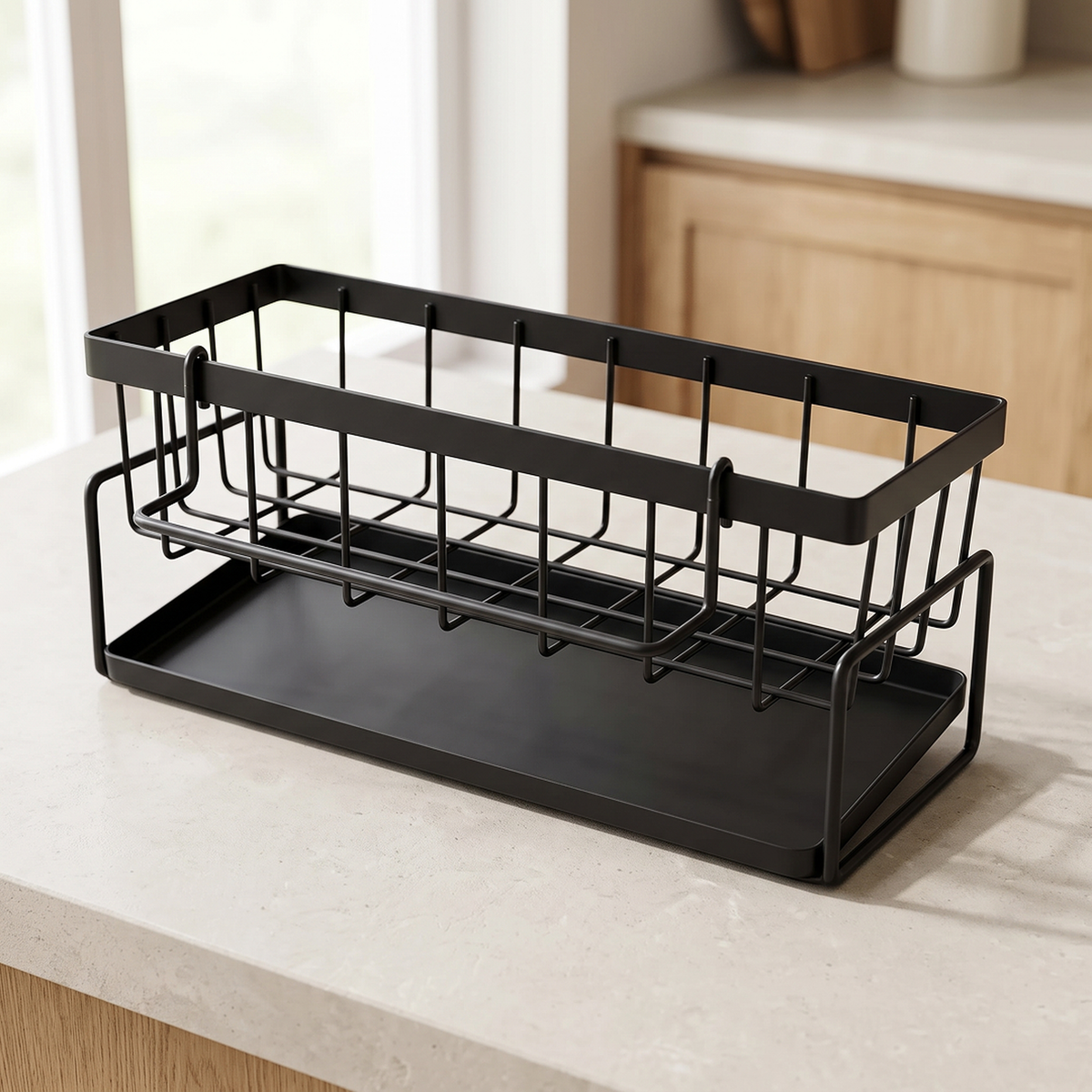 The empty black caddy on a sunlit worktop near the window, ready for sink essentials
