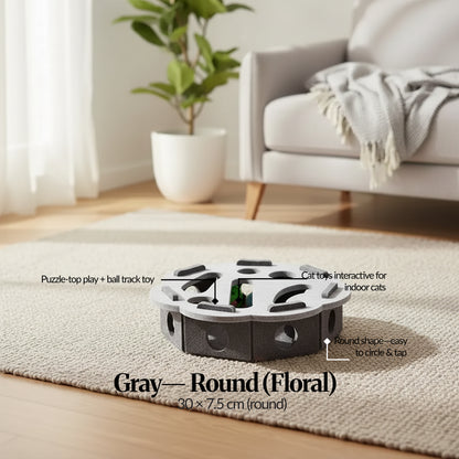 Variant ID — Gray (Round/Floral): Gray round floral-shaped cat track toy on rug with callouts for puzzle-top play; 30×7.5 cm.