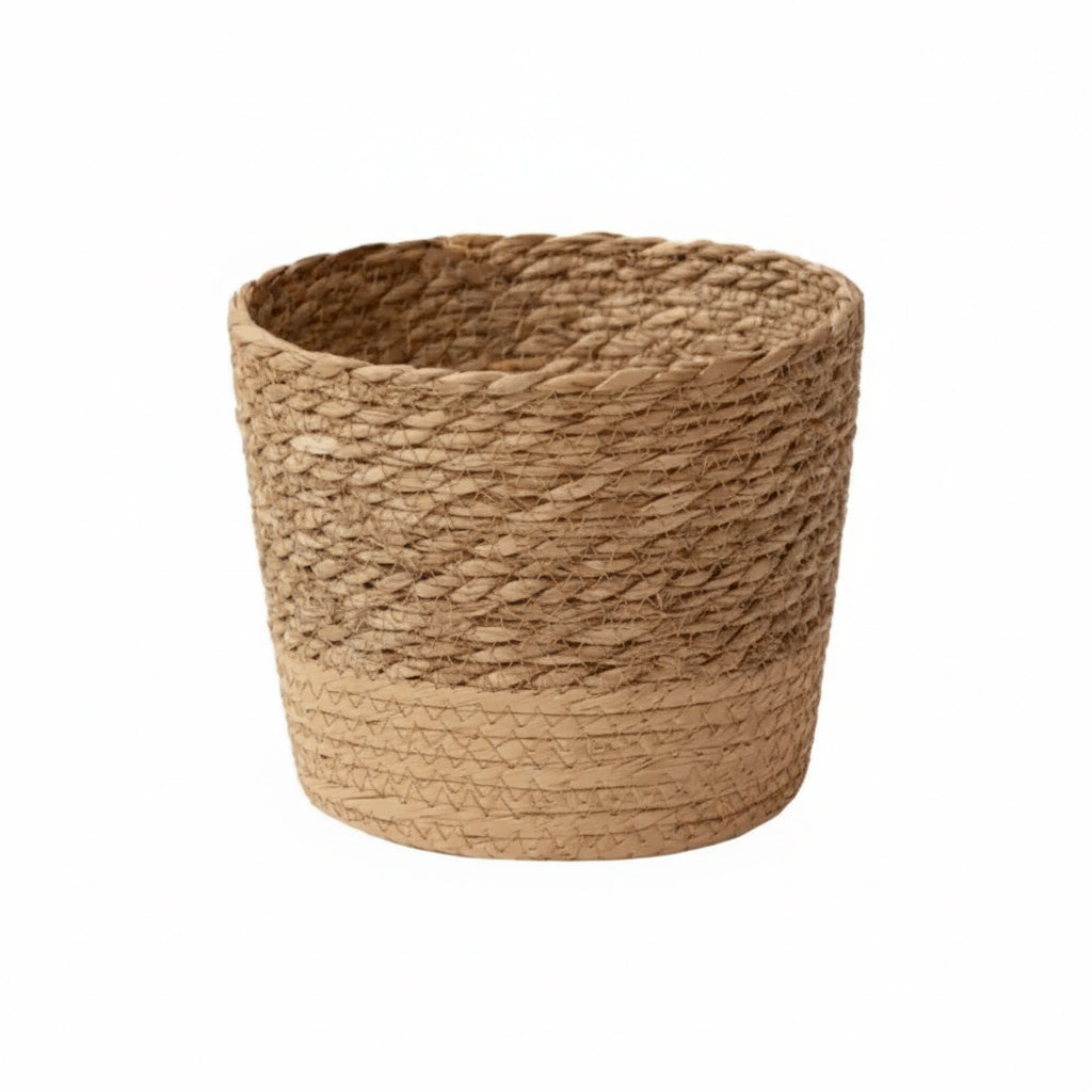 Woven seagrass planter basket on a white background, shown as a single cachepot