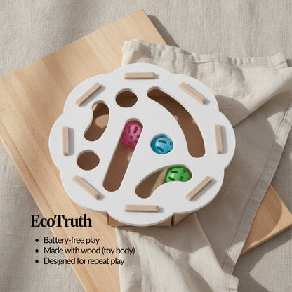 EcoTruth (material story): Camel white wooden cat ball track toy with floral puzzle-top and coloured balls; battery-free repeat play.