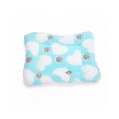 Teal guinea pig fleece bed mat with white heart pattern and grey dots, product-only on a white background (smaller centred view).