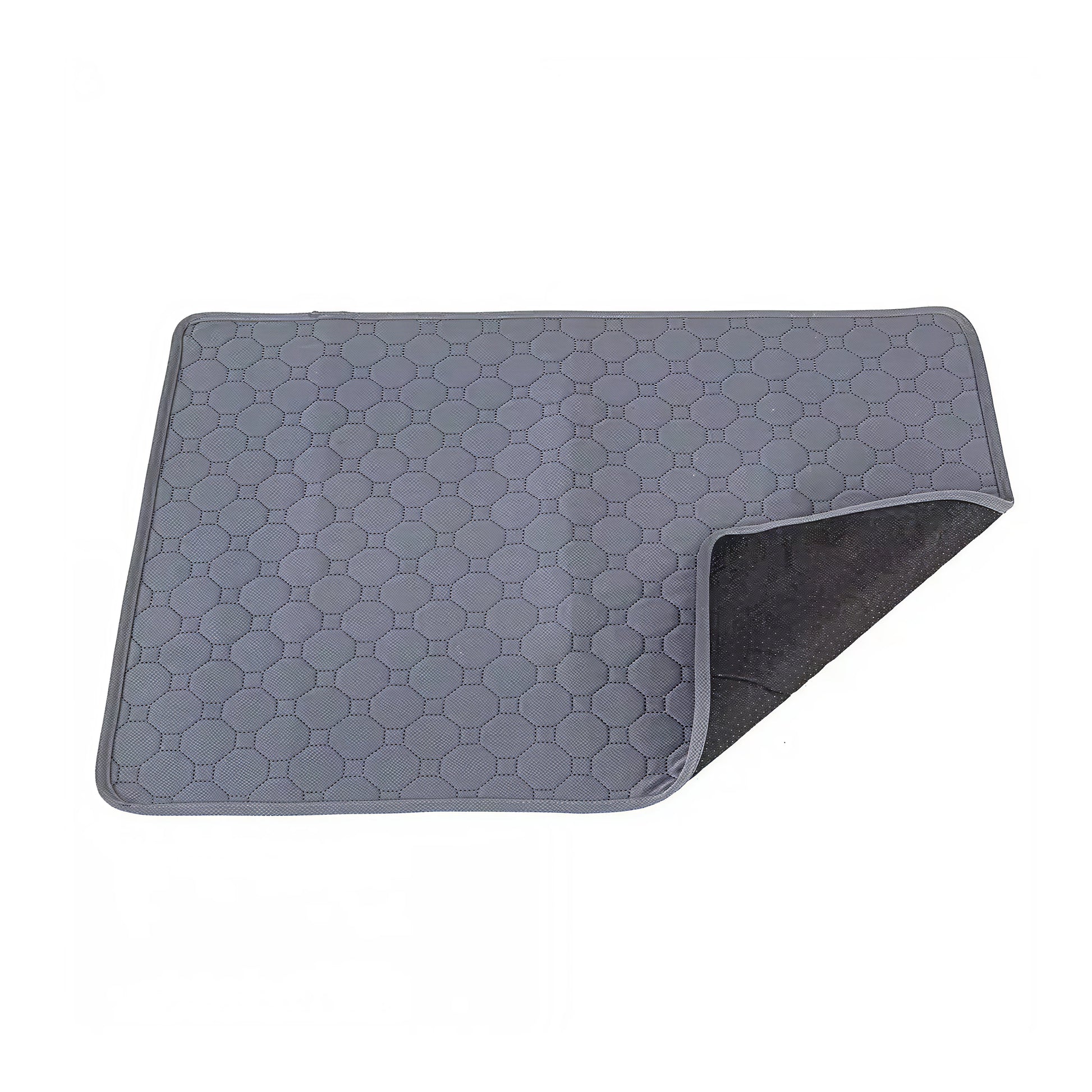 Product on white background: Grey quilted guinea pig cage liner photographed on white with one corner folded back to show the dark non-slip underside.
