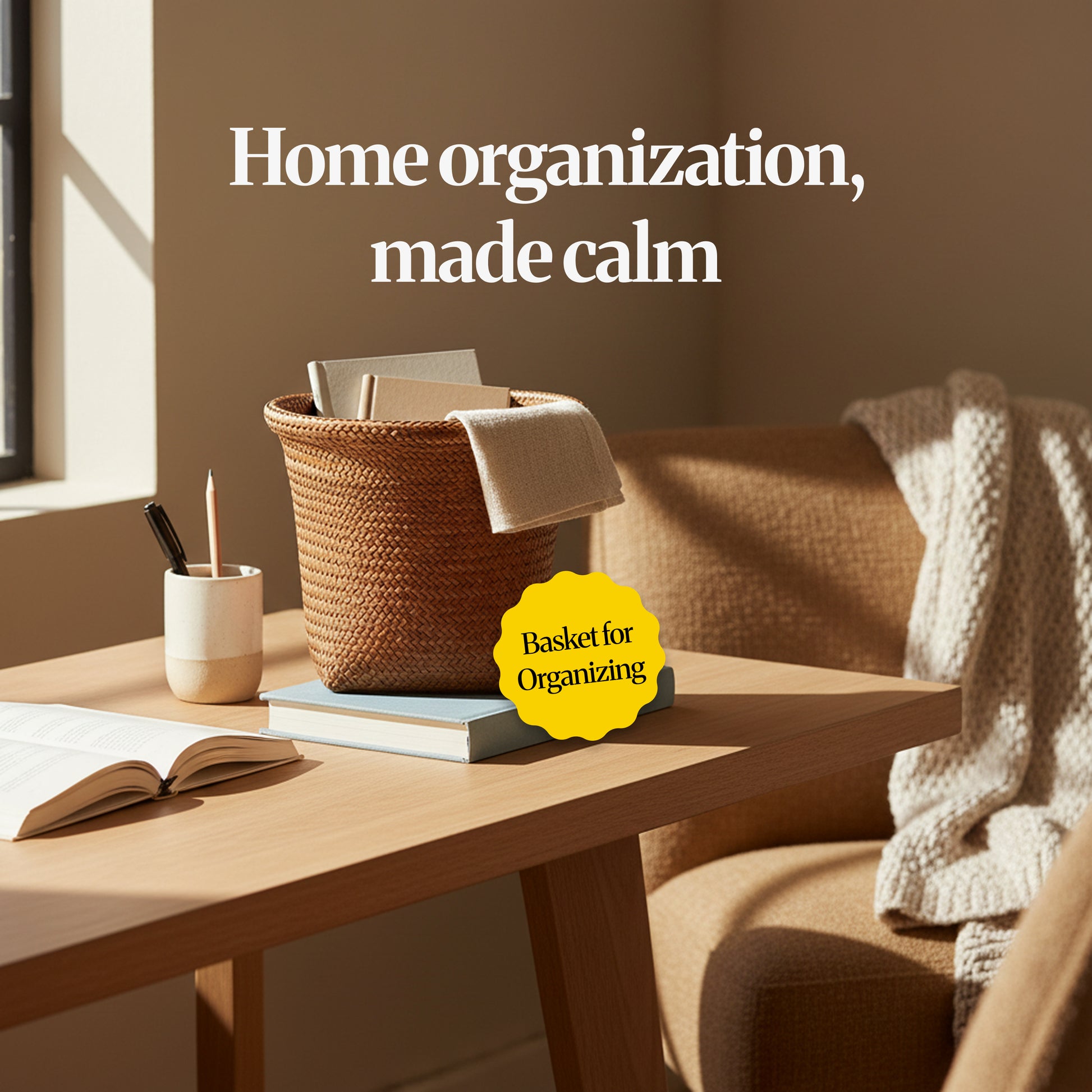 Lifestyle scene of a woven basket on a desk/table holding books and a cloth, styled as calm home organisation.