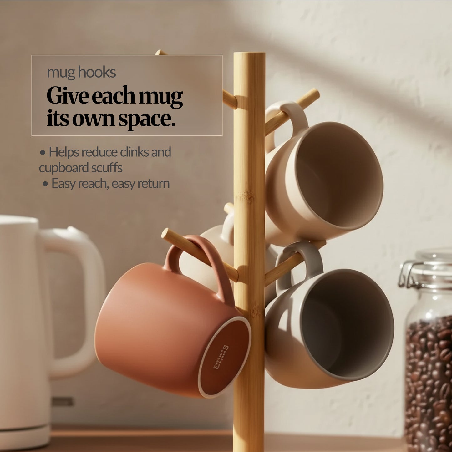 Bamboo mug tree with multiple angled hooks holding ceramic mugs, showing spaced hooks to keep mugs separate and reduce clinks; coffee jar in background.