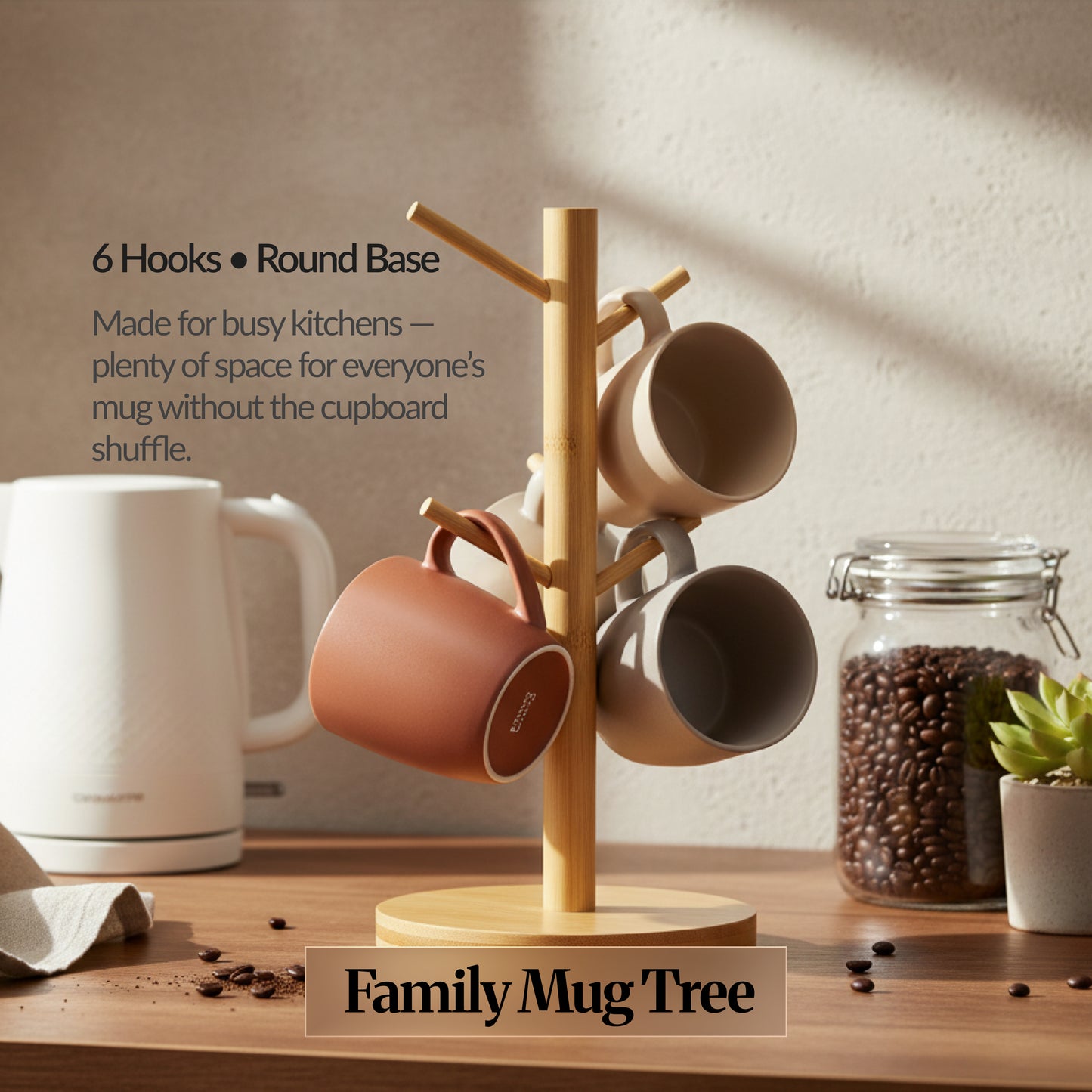 Family Mug Tree variant: bamboo mug holder with 6 hooks on a round base, holding several mugs on a kitchen counter (space-saving mug tree).