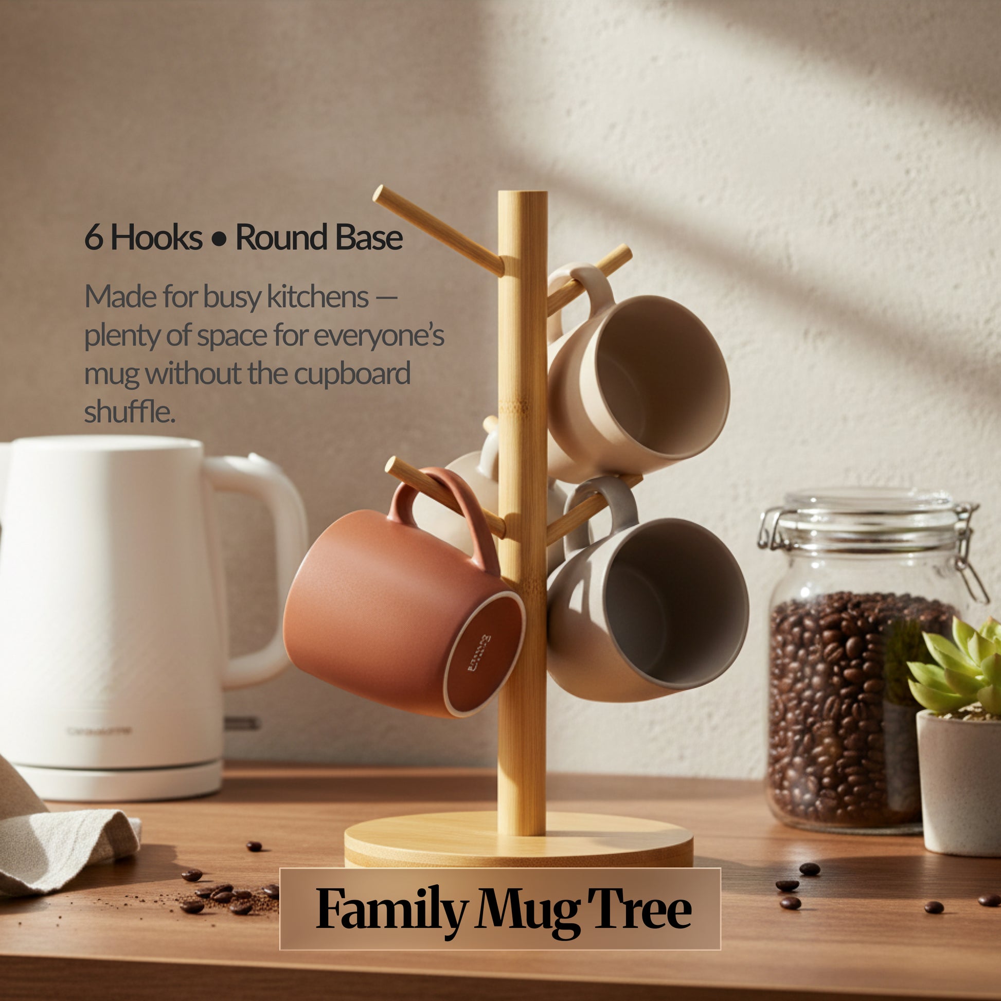 Family Mug Tree variant: bamboo mug holder with 6 hooks on a round base, holding several mugs on a kitchen counter (space-saving mug tree).