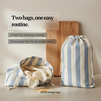 Two-pack bread storage set in blue stripe: one drawstring cotton bread bag standing and one open bag showing the removable inner liner for easier cleaning.