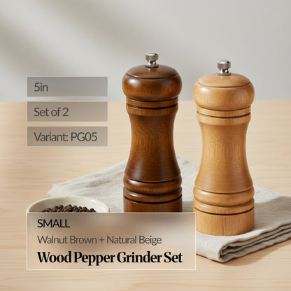 Small 5in wood pepper grinder set of 2 (walnut brown + natural beige) on a wooden surface with linen cloth and peppercorns; text overlay shows “Variant: PG05”.