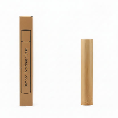 Portable bamboo toothbrush holder travel tube with matching cap and toothbrush on white background. 