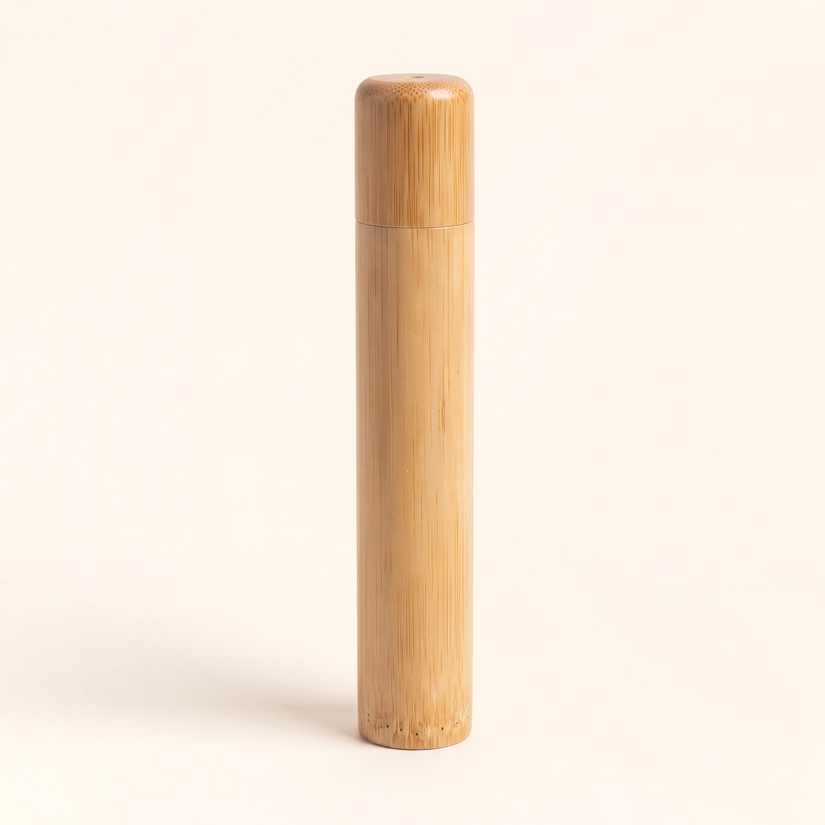 Shorter 16 cm children's bamboo toothbrush case standing upright on a cream background