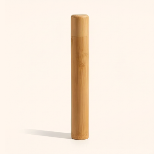 Bamboo toothbrush travel case, adult 21 cm, standing upright on a soft cream background
