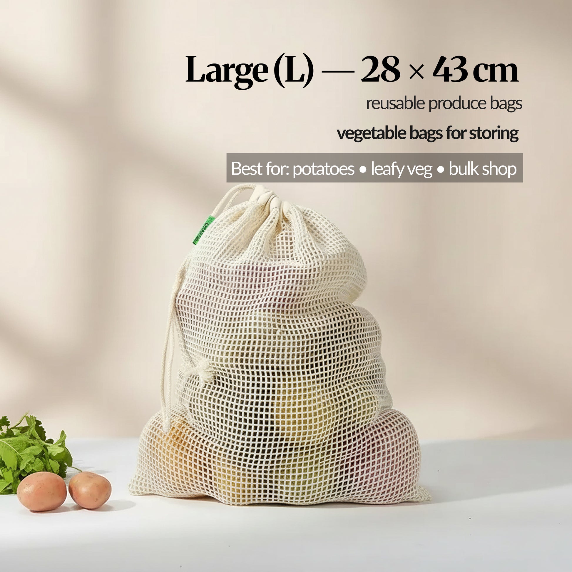 Large (L) cotton mesh produce bag (28 × 43 cm) filled with vegetables, with sizing and “best for” use guidance shown on the image.