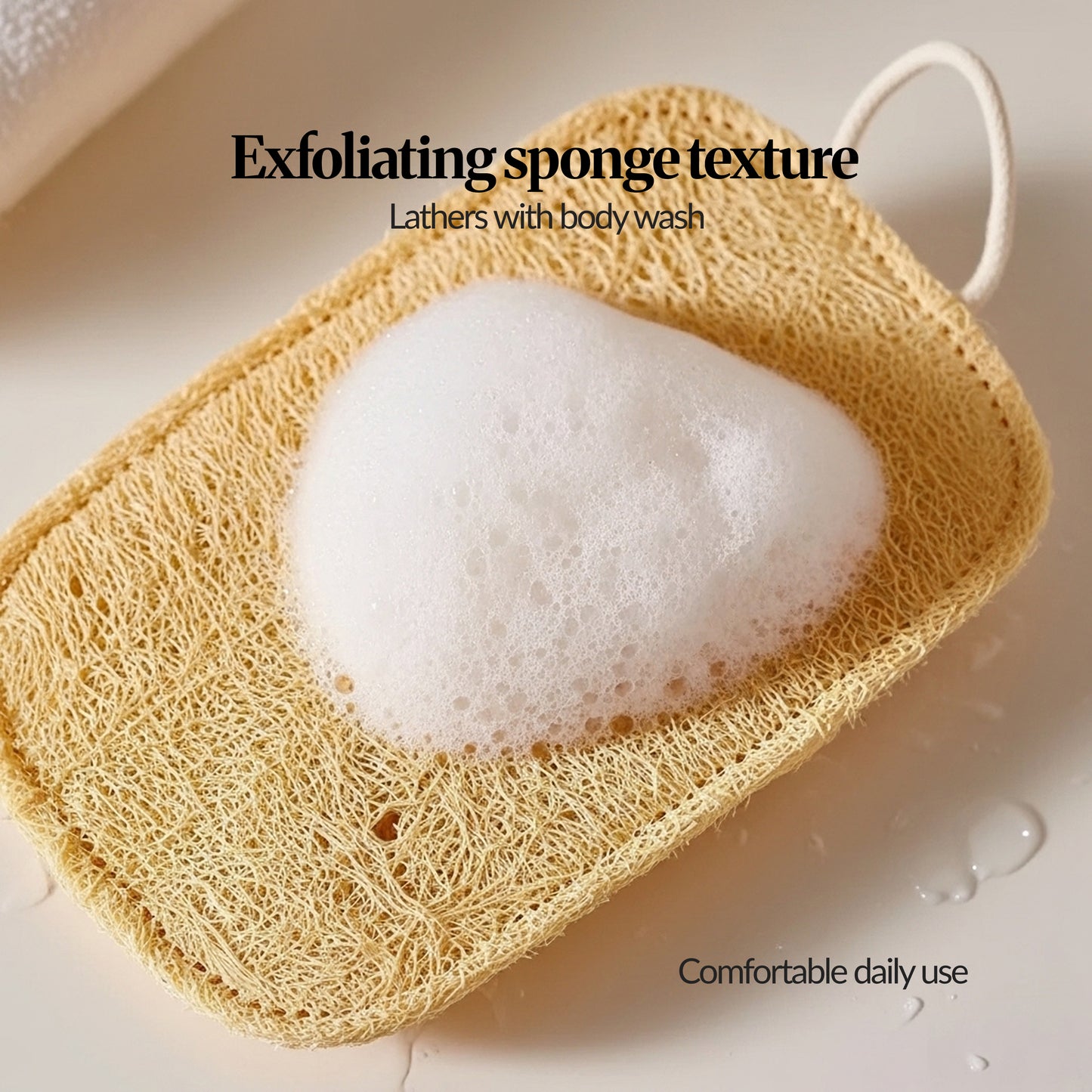 Close-up of loofah sponge texture lathering with body wash foam in a bath setting, highlighting exfoliating sponge-like surface for comfortable daily use.