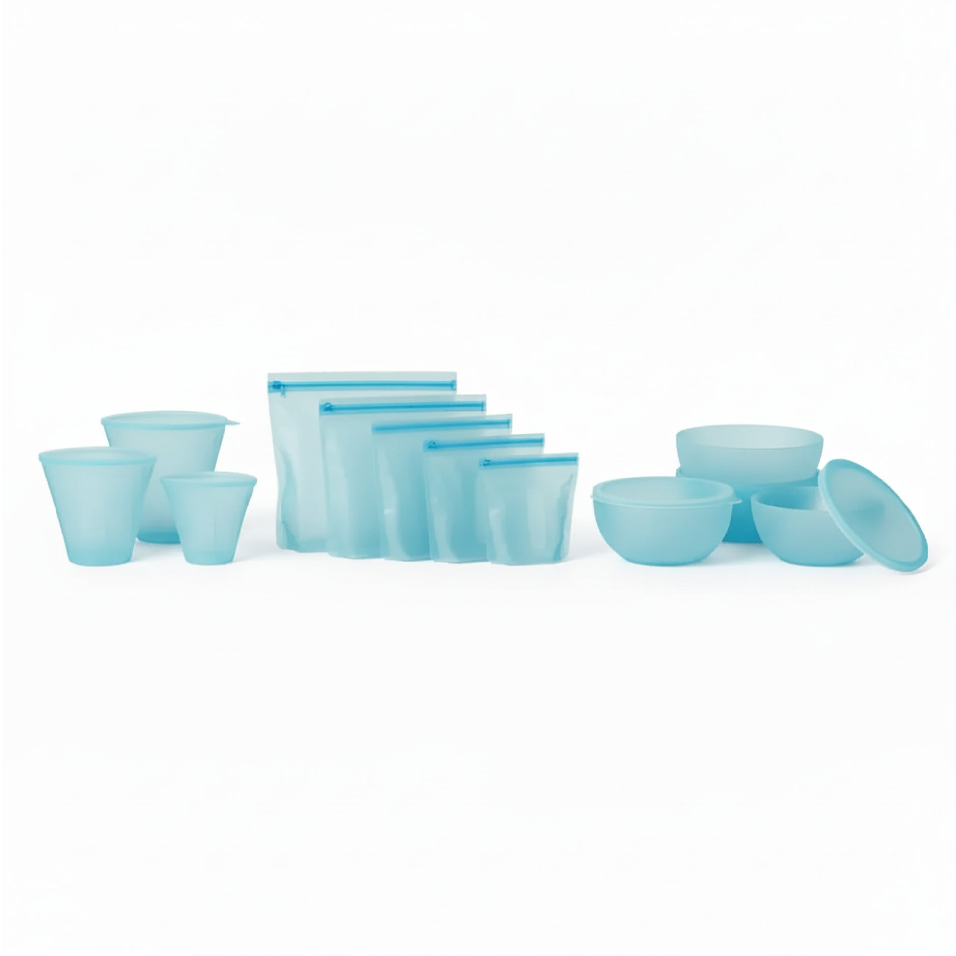 Set of blue silicon cups and bowls on a white background