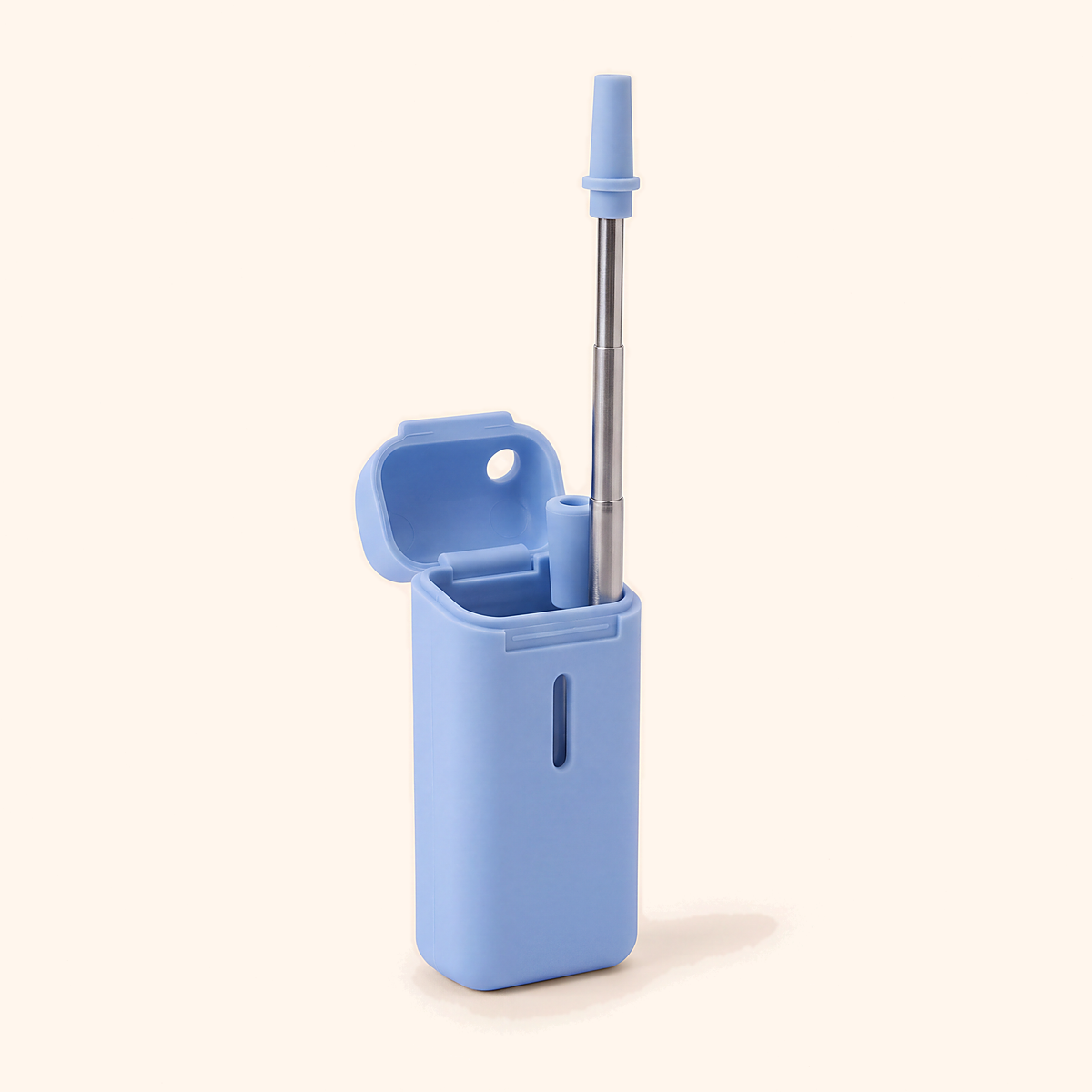 Blue case open beside the extended stainless steel straw with its blue mouthpiece tip