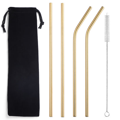 Gold stainless steel straw kit on a white background with a black drawstring pouch, two straight straws, two bent straws, and one cleaning brush.