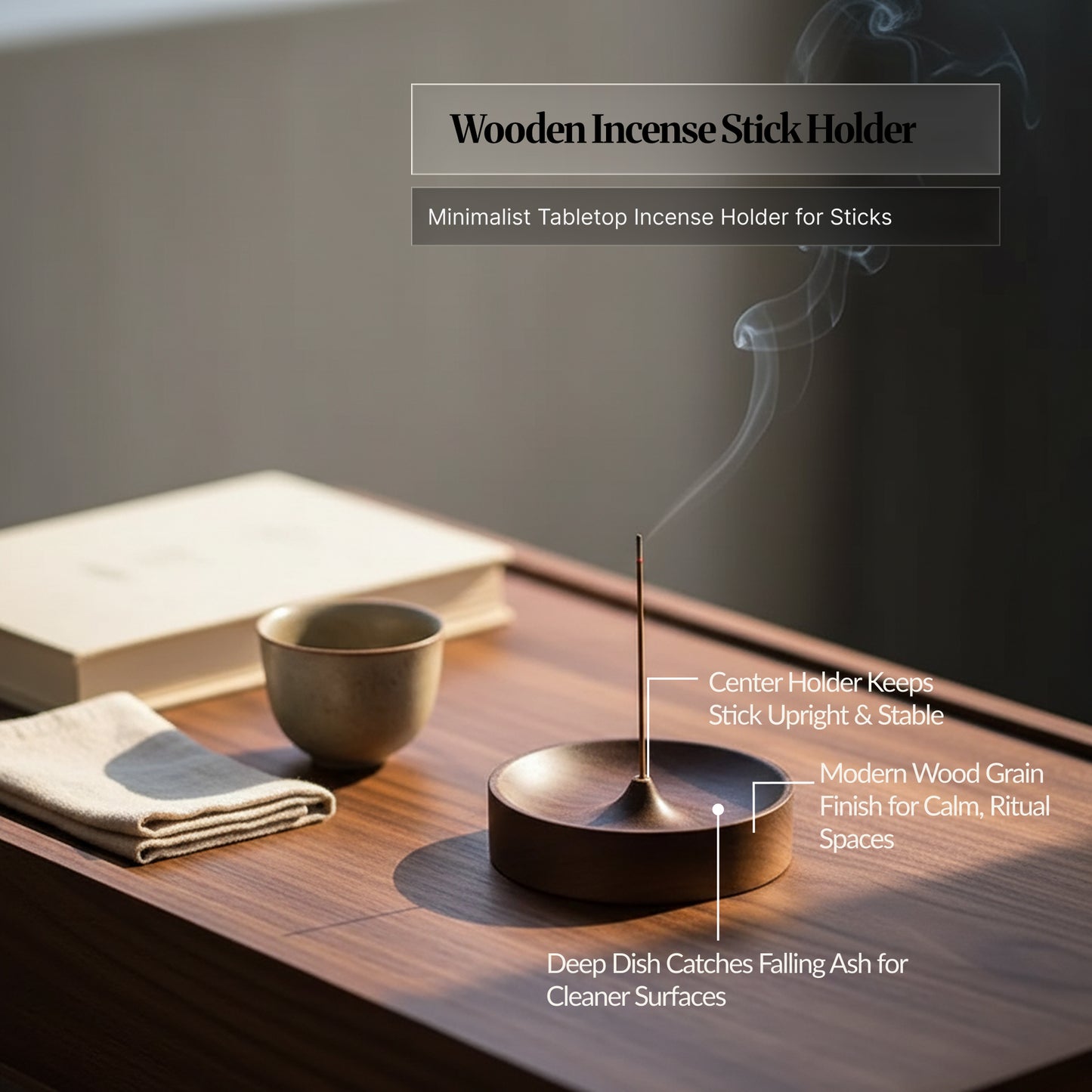 Wooden incense stick holder on a desk with callouts pointing to the centre holder, deep dish ash-catching bowl, and wood grain finish; smoke curls upward beside a cup and book.