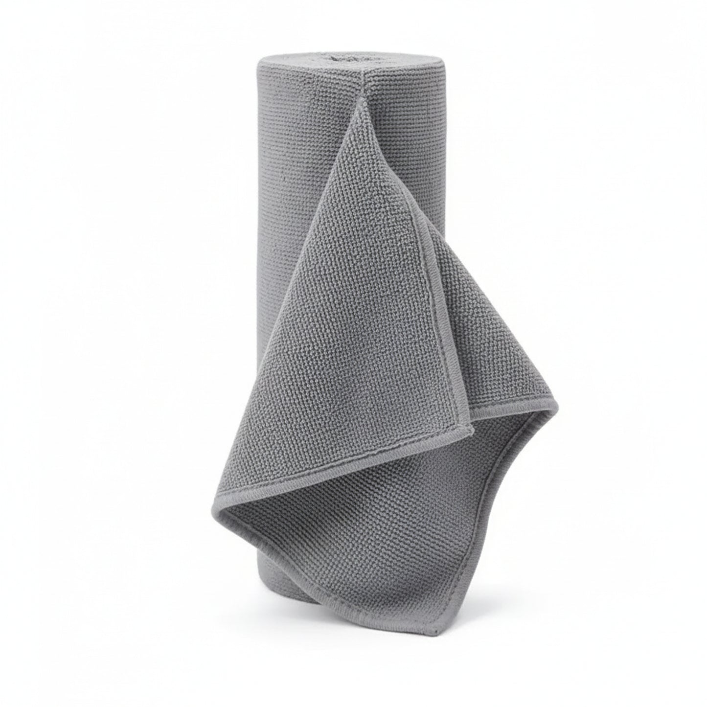 Grey Reusable microfiber paper towel roll standing upright on a plain white background 