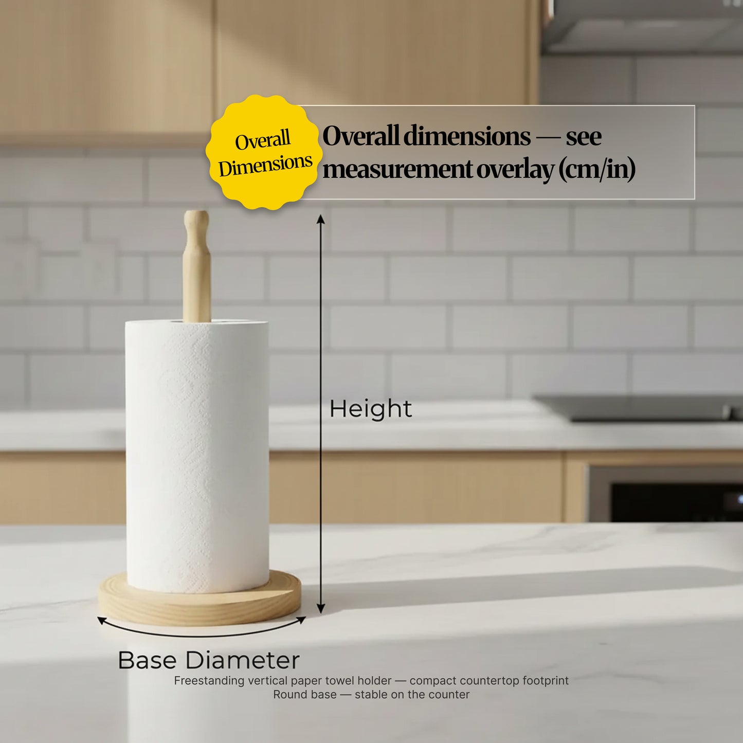 Paper towel holder shown on a kitchen counter with measurement overlay for height and base diameter, illustrating a compact footprint and stable round base.