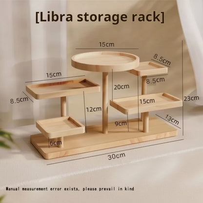 Size guide image of the “Libra storage rack” wooden tiered display stand with labelled measurements for the base, tier trays, and overall height and width.