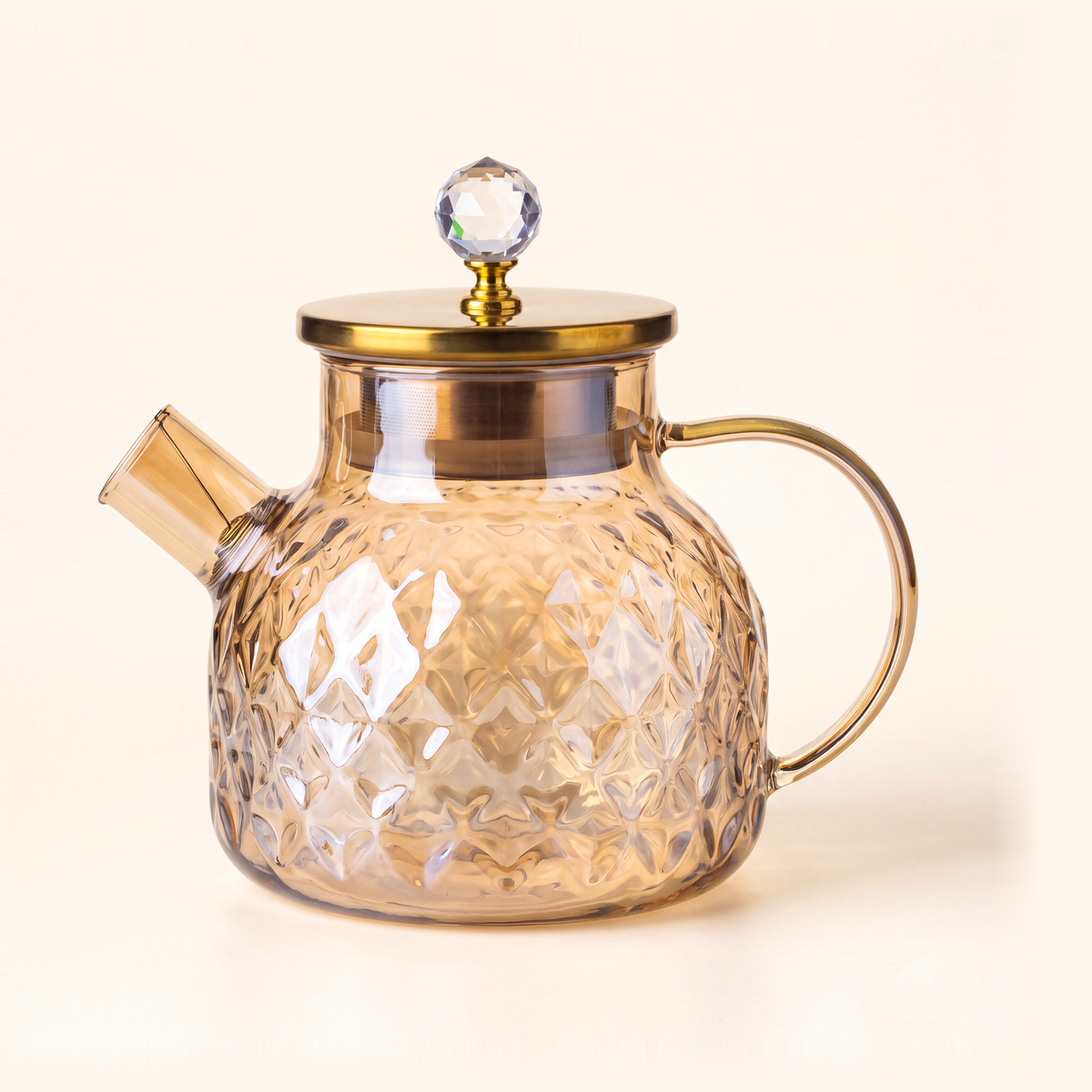 Amber glass water pitcher, 1 litre, with a gold-tone lid and crystal-look knob, on cream