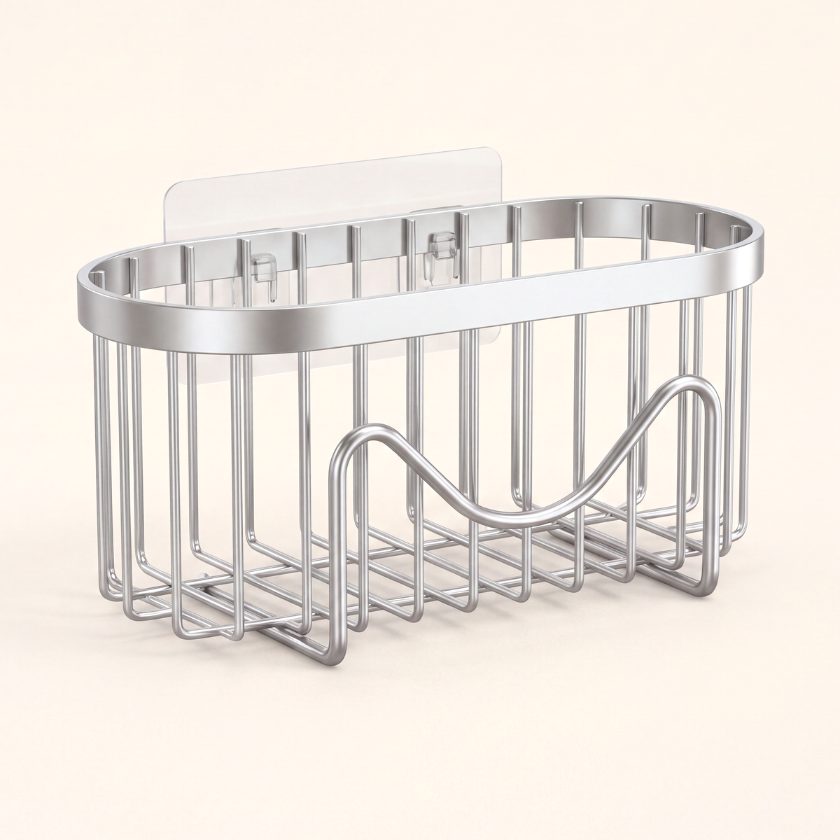 Silver sponge holder basket in front of a clear adhesive mounting plate